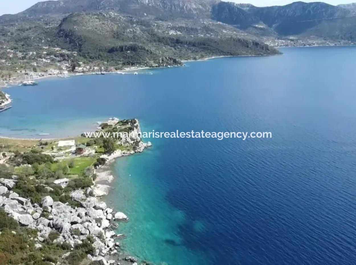 Grundstück Mit Meerblick Zum Verkauf Im Dorf Söğüt Im Bezirk Marmaris, Geeignet Für Investitionen 50 Meter Vom Meer Entfernt