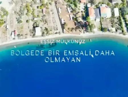 Marmaris Söğüt Mahallesi Denize Sıfır 2000M2 Arsa Satılık Müstakil Ev.önüne Tekne Bağlamaya Uygun.